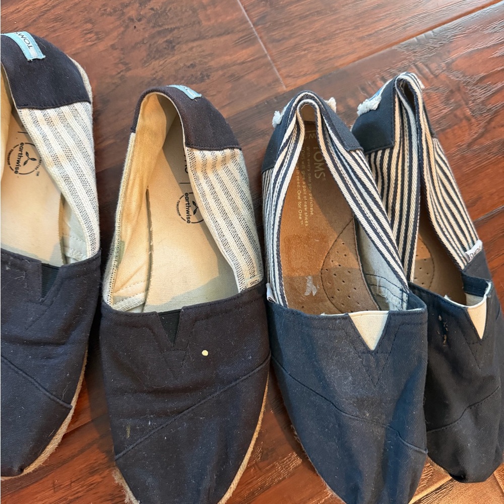 TOMS women’s Classic Slip-On Canvas Shoes in navy and black - two pairs
